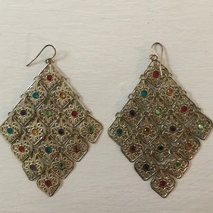 Dangly gold colored earrings