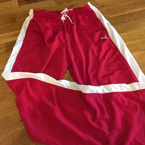 Puma red track pants. Size L