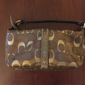 Coach mini handbag. Brown and gold with sequins.