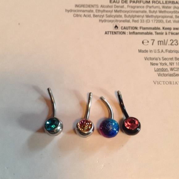 4 belly button rings w/o the tops - Picture 2 of 2