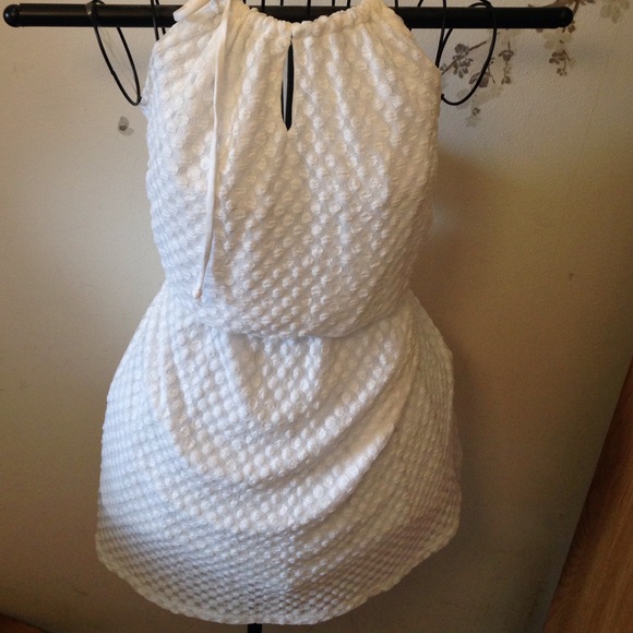 Halter, open back mini dress.