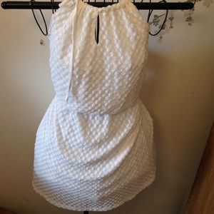 Halter, open back mini dress.