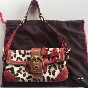 Coach purse, hair calf, suede and genuine leather.