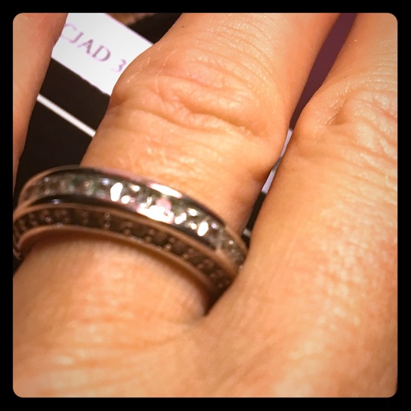 Woman size 5 wedding band Price firm.