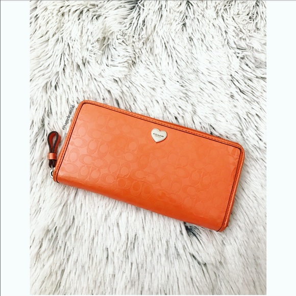 Coach Handbags - Coach Orange Zip Around Wallet