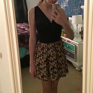 Navy blue v-neck and patterned dress