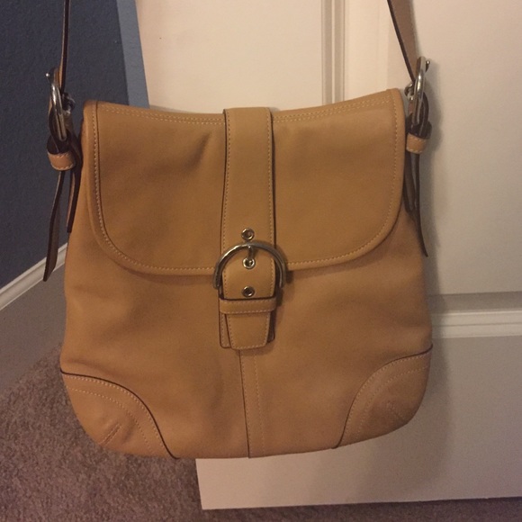 Light tan leather Coach cross-body/great condition
