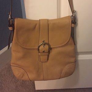 Light tan leather Coach cross-body/great condition