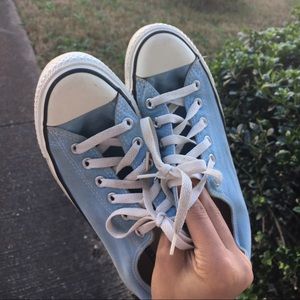 Baby blue converse.