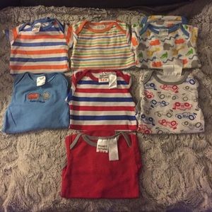 7 onesies, size 3-6 months