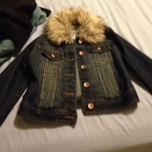 Blue jean jacket with fur collar