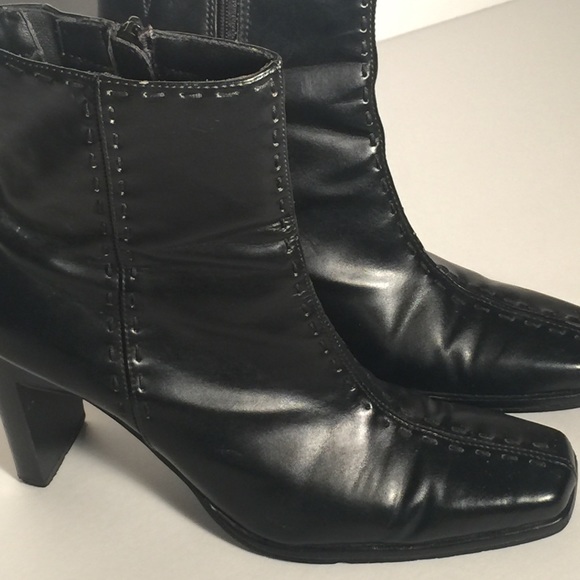 Black heeled leather short boots