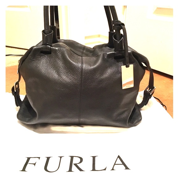Like new- Furla large purse, black pebble leather