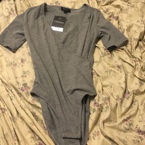 Brand new body suit from Topshop super cute