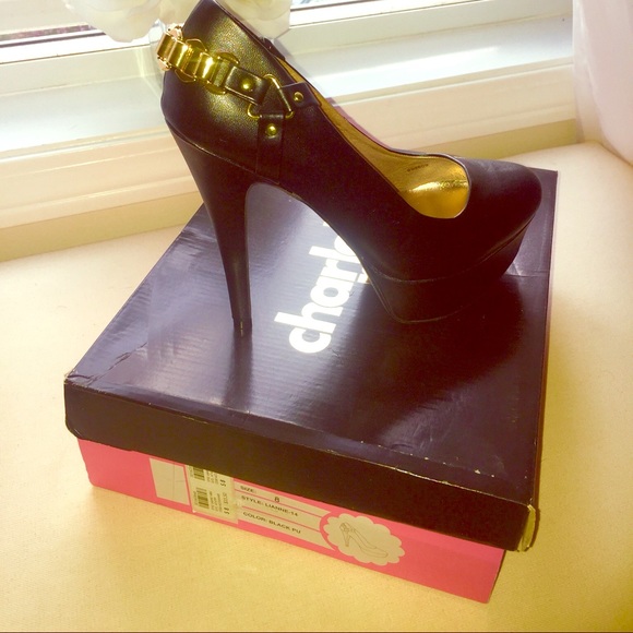 Black platform heel with gold strap