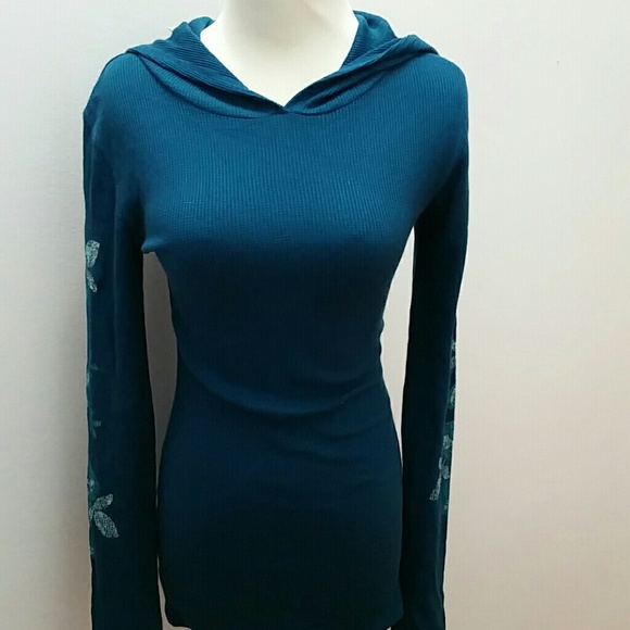 Long teal thermal hoodie with floral design.