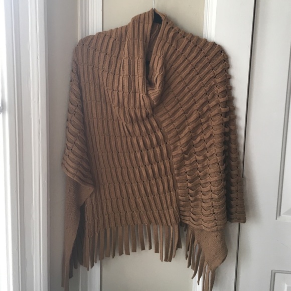 Tan woven poncho.