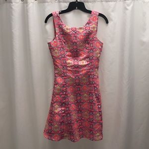 Multicolored brocade A-line keyhole back dress.
