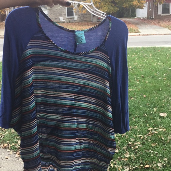 A multi color pattern shirt.