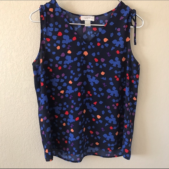 Bright colored sleeveless shirt