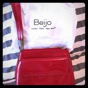 Beijo red patent wristlet