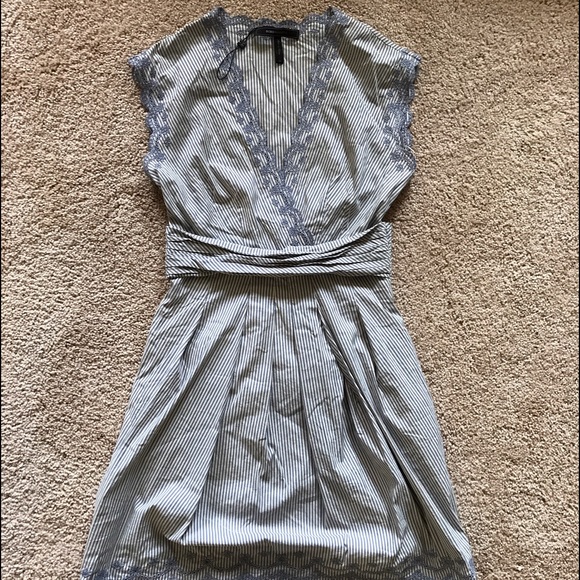 Pleated Dress with embroidery.