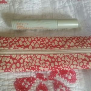 Origins ginzing mascara and makeup bag