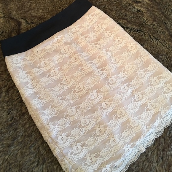 Mauve lace and black skirt.