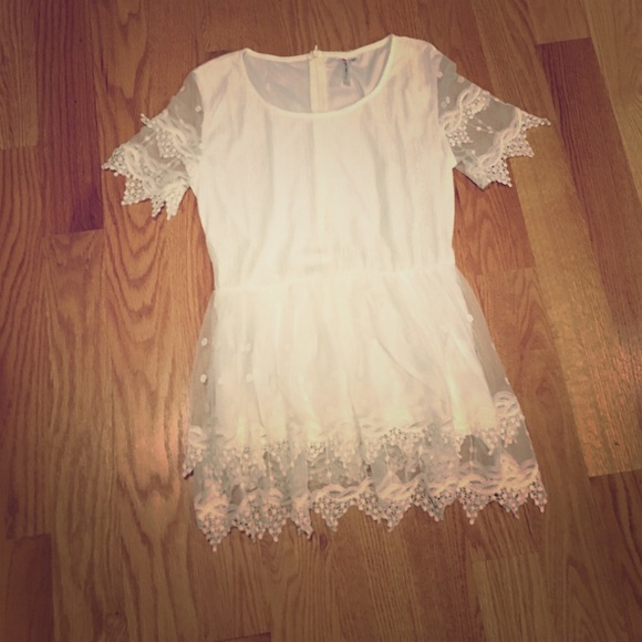 NWOT - White peplum top with beautiful lace detail