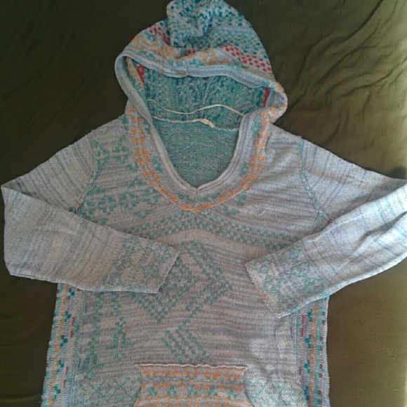 Hippie-style knitted hoodie poncho