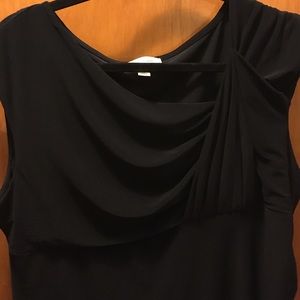 Sleek, classy, well constructed black top.