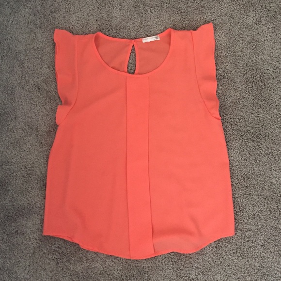 Orange shirt. Size M