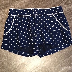 Navy blue polka dot shorts with pockets