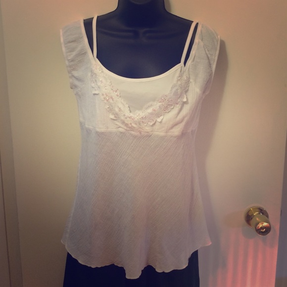 Pretty, sparkly, cap-sleeved, white top.