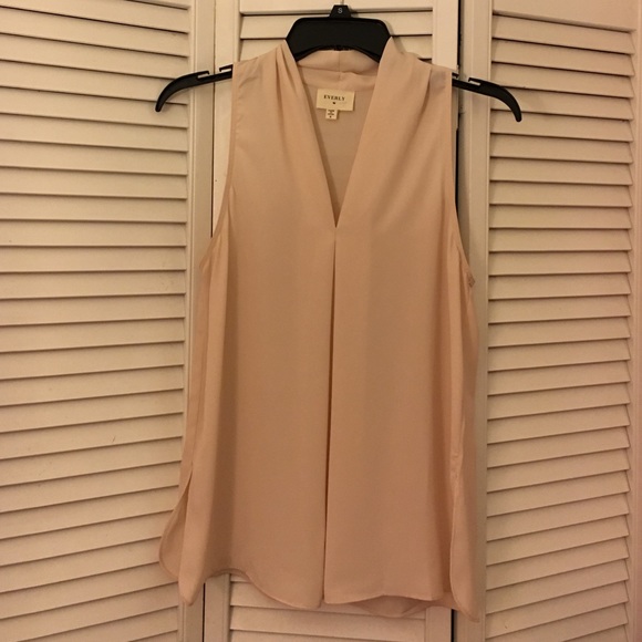 Light pink sleeveless blouse