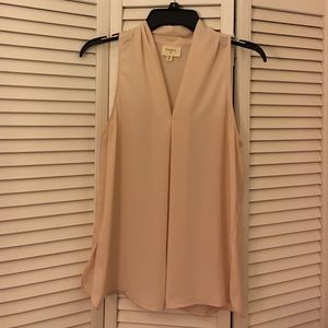 Light pink sleeveless blouse
