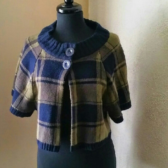 Cape style, big-box plaid sweater