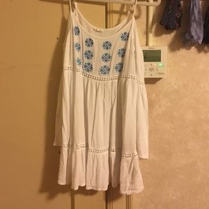 Cold shoulder long sleeve top with flower detail