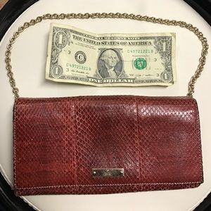 Authentic Gucci red wallet clutch with chain.