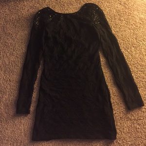 Fitted, black dress.