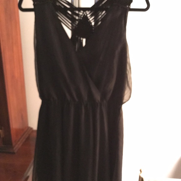 Bebe black cocktail dress with strappy back