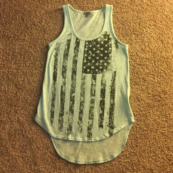 Light blue tank top.