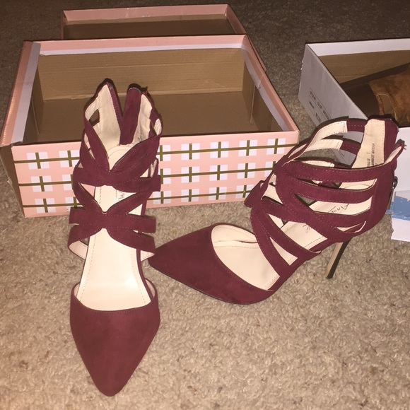 Burgundy red close toed heels.