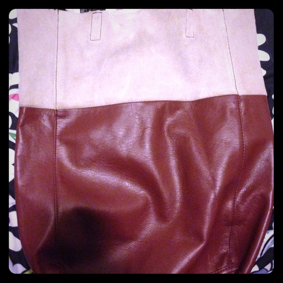 A tan and burgundy h&m purse