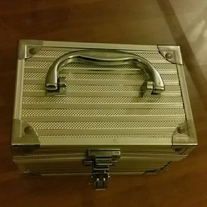 A jewlery metal box with mirror  in sid.