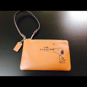 Coach x Snoopy brown wristlet