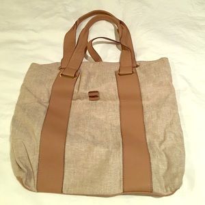 BCBG canvas tote with leather trim.