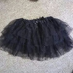 Black tutu with sparkles in it