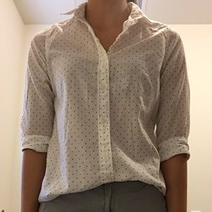 White and black polka dotted button down shirt