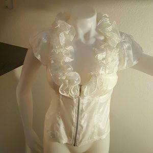 Laced back ruffled cleavage zip up white blouse